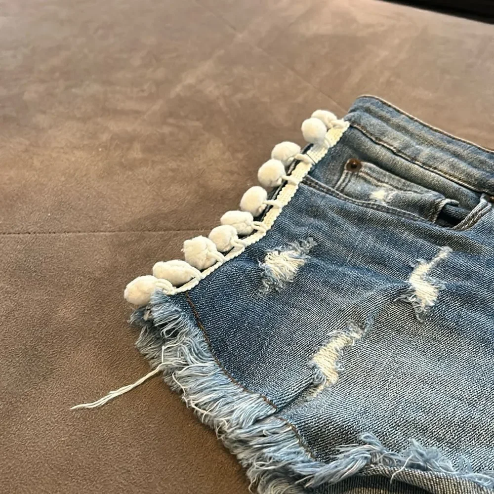 STS Blu Distressed Blue Jean Shorts with Pom-Pom Trim - Picture 7 of 12